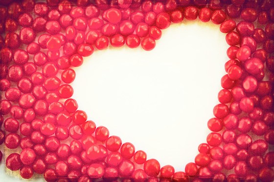heart-shape-outlined-by-red-cinnamon-candy-kim-fearheiley-photography